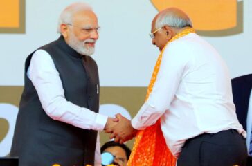 Narendra Modi attends the swearing-in ceremony of Bhupendra Patel