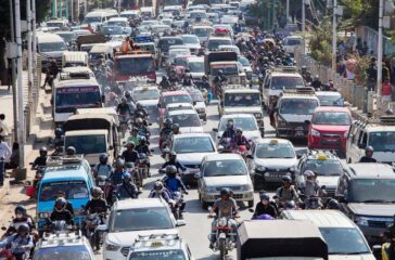 traffic-moves-slowly-along-busy-road-kathmandu-nepal-october-crowded-jam-city-80106533