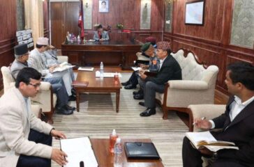 Prachanda with the head of security