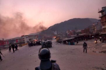 Transport workers set fire to a police van