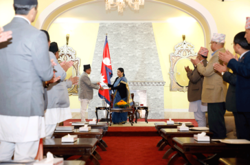 Dinesh-Kumar-Thapaliya-submits-election-report-to-President-Bidya-Devi-Bhandari.