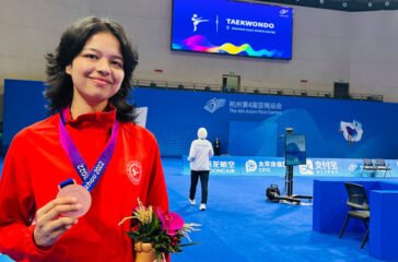 palesha-goverdhan-with-medal.