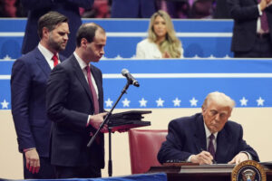 President Donald Trump signs executive orders