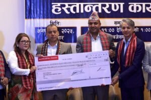 High-level committee hands over Rs 8.3 million to NRNA led by Mahesh Shrestha