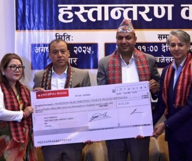 High-level committee hands over Rs 8.3 million to NRNA led by Mahesh Shrestha