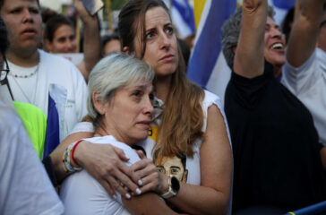 Seven Israeli hostages freed from Hamas captivity return home, reunite with families