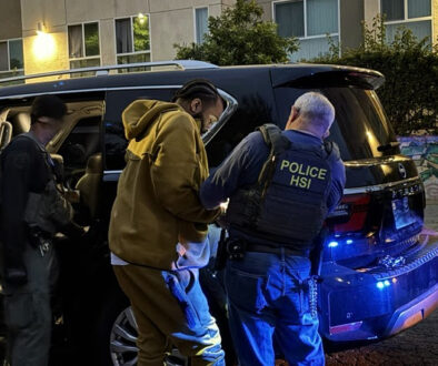 Nakahli Miller being prepared for transport after his arrest